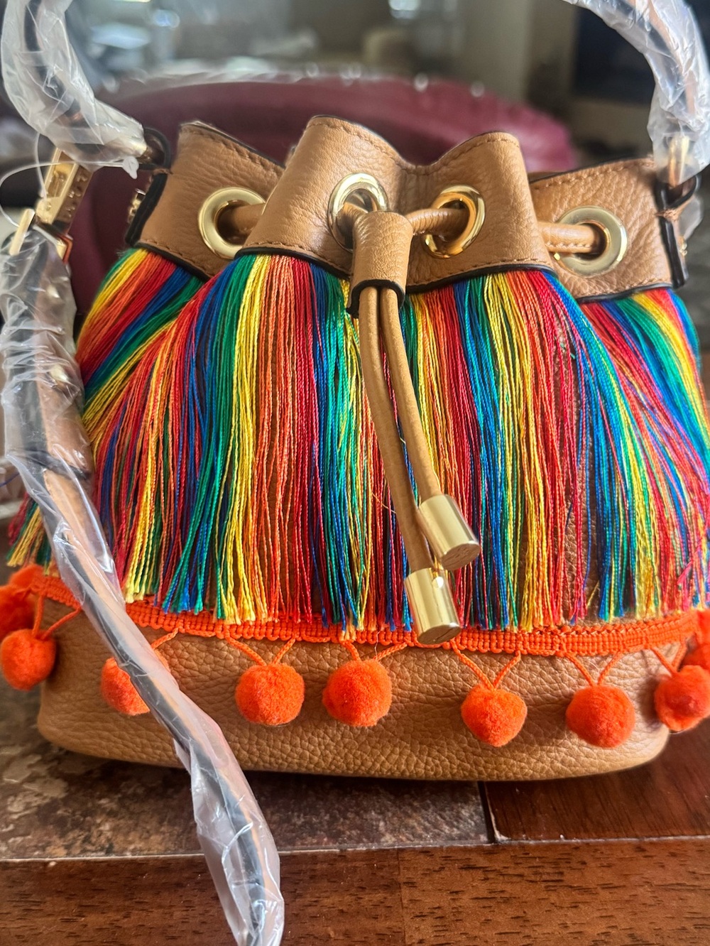 NWT Milly Tan Bucket Bag Crossbody with Rainbow Fringe and Orange Pom-Poms - Picture 2 of 6